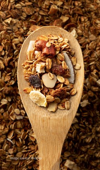 Granola bar's main ingredient is grains which mostly use oats. Combined with nuts, seeds and dried fruits, liquid sweeteners such as honey or maple syrup and oil are added, and baked to make granola bars.